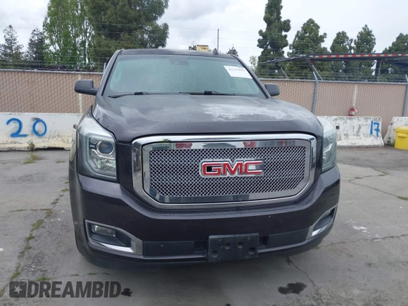 2015 GMC Yukon SLT with VIN 1GKS1BKC6FR245564, listed as a IAAI auction lot 42139295 with 149,088 mi miles. Bid and sale history available at carsss.com. Image 12.