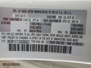 2016 Mazda Mazda3 i Grand Touring with VIN 3MZBM1N7XGM299803, listed as a Copart auction lot 43947935 with 94,179 mi miles and Salvage Title. Bid and sale history available at carsss.com. Image 14.