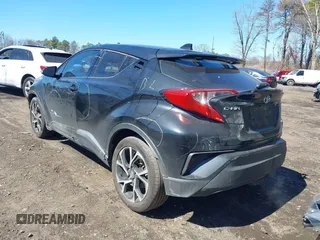 2019 Toyota C-HR XLE with VIN JTNKHMBXXK1019814, listed as a IAAI auction lot 41884485 with 53,101 mi miles. Bid and sale history available at carsss.com. Image 3.