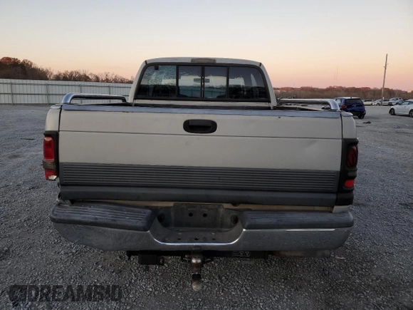 1996 Dodge 1500 z VIN 3B7HC13Y8TG197971, wystawiony jako Copart lot #82565154 z przebiegiem 248 833 mil mil oraz Szkoda całkowita • Salvage title. Historia ofert i sprzedaży dostępna na DreamBid. Obrazek 6.