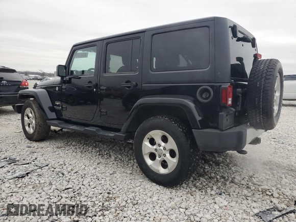2015 Jeep Wrangler Unlimited Sahara with VIN 1C4BJWEGXFL606573, listed as a Copart auction lot 83983894 with 103,314 mi miles and Clean title. Bid and sale history available at DreamBid. Image 2.