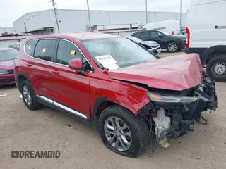 2019 Hyundai Santa Fe SE z VIN 5NMS23AD4KH076717, wystawiony jako IAAI lot #41931434 z przebiegiem 154 866 mil mil oraz . Historia ofert i sprzedaży dostępna na DreamBid. Obrazek 1.