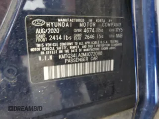 2021 Genesis G70 2.0T with VIN KMTG34LA0MU072088, listed as a Copart auction lot 57433985 with 77,876 mi miles and Clean title. Bid and sale history available at DreamBid. Image 12.