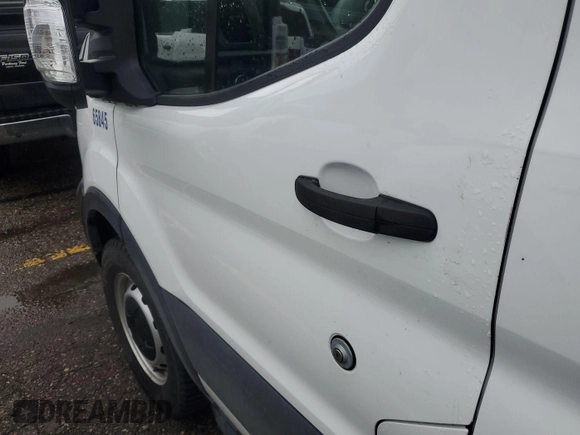 2021 Ford Transit Cargo with VIN 1FTBR1Y82MKA76523, listed as a IAAI auction lot 42731352 with 39,449 mi miles and . Bid and sale history available at DreamBid. Image 4.