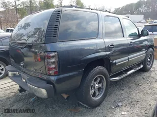 2003 Chevrolet Tahoe LS with VIN 1GNEC13ZX3R209167, listed as a IAAI auction lot 41496637 with 325,006 mi miles. Bid and sale history available at carsss.com. Image 4.