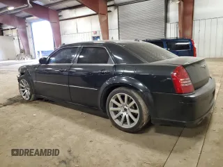 2006 Chrysler 300 C SRT8 with VIN 2C3LA73WX6H106631, listed as a Copart auction lot 50715715 with 104,990 mi miles and Clean Title. Bid and sale history available at carsss.com. Image 2.