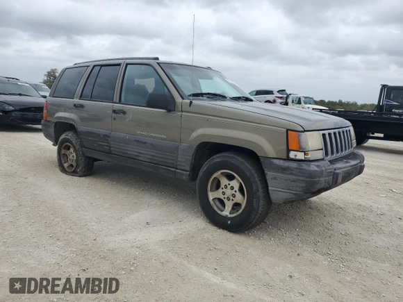 1998 Jeep Grand Cherokee Laredo with VIN 1J4GZ58S6WC137968, listed as a Copart auction lot 84083454 with 0 mi miles and Non Repairable. Bid and sale history available at carsss.com. Image 4.