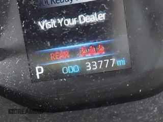 2022 Toyota Corolla Cross L with VIN 7MUAAABG6NV032964, listed as a IAAI auction lot 42458401 with 33,777 mi miles and . Bid and sale history available at DreamBid. Image 7.