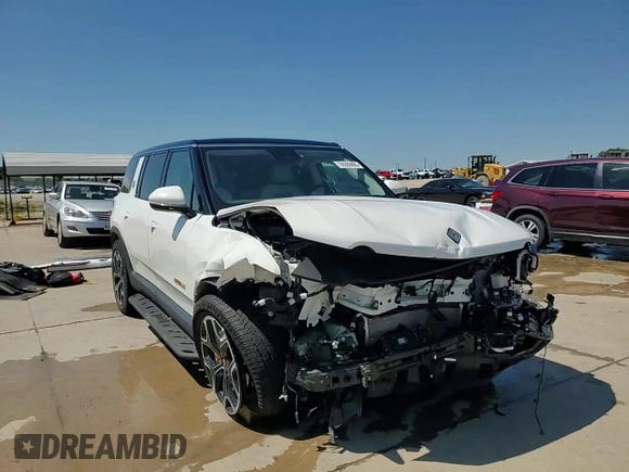 2023 Rivian R1S Launch Edition z VIN 7PDSGABL9PN010792, wystawiony jako Copart lot #56359465 z przebiegiem 24 319 mil mil oraz Szkoda całkowita • Salvage title. Historia ofert i sprzedaży dostępna na DreamBid. Obrazek 15.