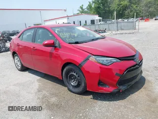 2018 Toyota Corolla L with VIN 5YFBURHE8JP808511, listed as a IAAI auction lot 42369784 with 123,472 mi miles and . Bid and sale history available at DreamBid. Image 1.