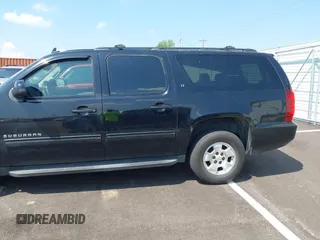 2011 Chevrolet Suburban LT with VIN 1GNSKJE34BR151246, listed as a IAAI auction lot 42520210 with 239,240 mi miles and . Bid and sale history available at DreamBid. Image 3.