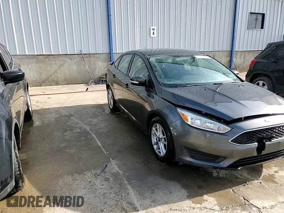 2016 Ford Focus SE with VIN 1FADP3F21GL335905, listed as a Copart auction lot 53837225 with 149,043 mi miles and Salvage title. Bid and sale history available at DreamBid. Image 14.