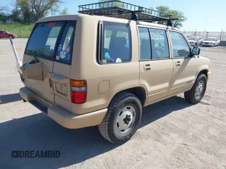 1994 Isuzu Trooper z VIN JACDH58VXR7912645, wystawiony jako IAAI lot #42207513 z przebiegiem 321 148 mil mil oraz . Historia ofert i sprzedaży dostępna na DreamBid. Obrazek 4.