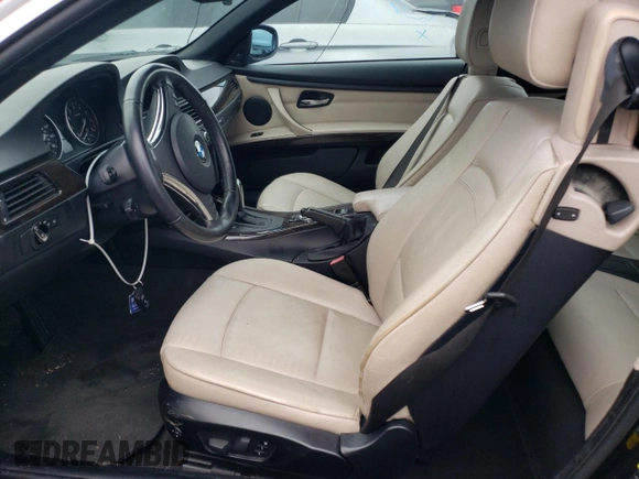 2012 BMW 3 Series 335i with VIN WBADX7C5XCE744190, listed as a Copart auction lot 63581925 with 103,834 mi miles and Clean title. Bid and sale history available at DreamBid. Image 7.
