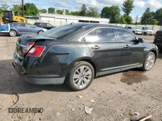 2012 Ford Taurus Limited z VIN 1FAHP2FW6CG136463, wystawiony jako Copart lot #57159005 z przebiegiem 124 833 mil mil oraz Szkoda całkowita • Salvage title. Historia ofert i sprzedaży dostępna na DreamBid. Obrazek 3.