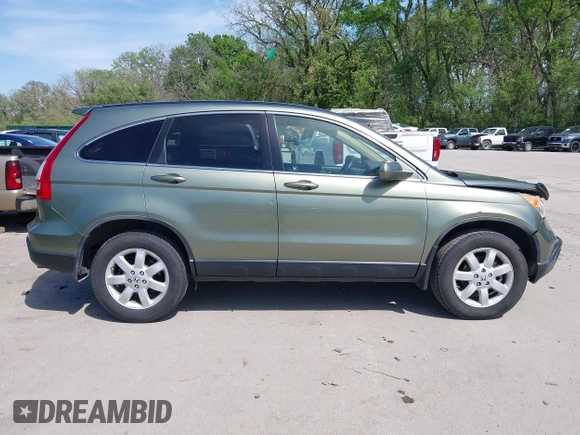 2007 Honda CR-V EX-L z VIN JHLRE387X7C073092, wystawiony jako IAAI lot #42090276 z przebiegiem 150 297 mil mil oraz . Historia ofert i sprzedaży dostępna na DreamBid. Obrazek 14.