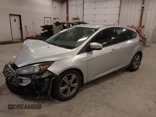 2016 Ford Focus SE with VIN 1FADP3KE2GL377824, listed as a IAAI auction lot 41461648 with 112,038 mi miles and . Bid and sale history available at carsss.com. Image 2.