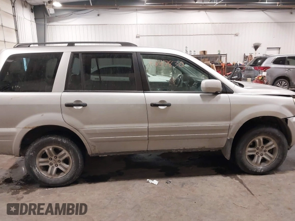 2005 Honda Pilot EX-L with VIN 2HKYF18575H557005, listed as a IAAI auction lot 41647830 with 245,992 mi miles. Bid and sale history available at carsss.com. Image 13.
