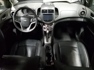 2014 Chevrolet Sonic LTZ with VIN 1G1JE5SB8E4213028, listed as a Copart auction lot 43561105 with 81,457 mi miles and Salvage Title. Bid and sale history available at carsss.com. Image 8.