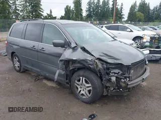 2007 Honda Odyssey EX-L z VIN 5FNRL38647B457673, wystawiony jako IAAI lot #42421228 z przebiegiem 298 106 mil mil oraz . Historia ofert i sprzedaży dostępna na DreamBid. Obrazek 1.
