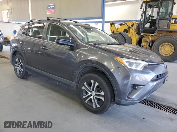 2018 Toyota RAV4 LE with VIN JTMBFREV9JJ743672, listed as a Copart auction lot 62510955 with 141,971 mi miles and Salvage title. Bid and sale history available at DreamBid. Image 4.