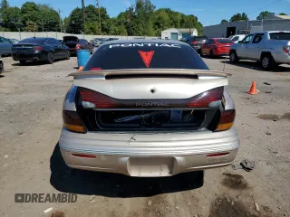 1998 Pontiac Bonneville SE z VIN 1G2HX52K0W4238012, wystawiony jako Copart lot #70997824 z przebiegiem 146 825 mil mil oraz Szkody całkowita. Historia ofert i sprzedaży dostępna na DreamBid. Obrazek 6.
