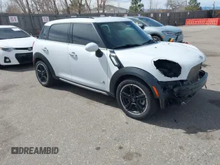 2016 MINI Countryman S with VIN WMWZC5C57GWU22015, listed as a IAAI auction lot 41806547 with 65,124 mi miles and . Bid and sale history available at DreamBid. Image 1.