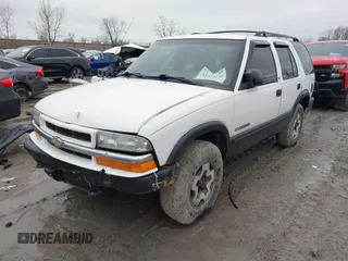 2003 Chevrolet Blazer LS z VIN 1GNDT13X63K106315, wystawiony jako IAAI lot #41914116 z przebiegiem 196 774 mil mil oraz . Historia ofert i sprzedaży dostępna na DreamBid. Obrazek 2.