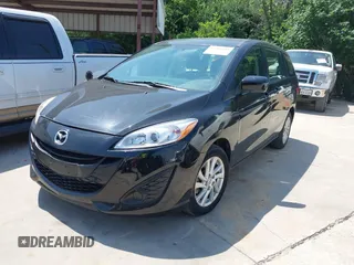 2012 Mazda 5 Sport z VIN JM1CW2BL0C0142657, wystawiony jako IAAI lot #42389495 z przebiegiem 107 790 mil mil oraz . Historia ofert i sprzedaży dostępna na DreamBid. Obrazek 2.
