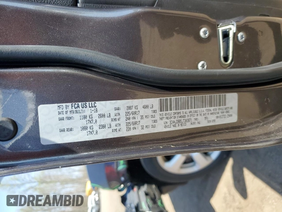 2018 Jeep Compass Latitude z VIN 3C4NJDBB5JT303871, wystawiony jako Copart lot #53881965 z przebiegiem 130 061 mil mil oraz Szkoda całkowita • Salvage title. Historia ofert i sprzedaży dostępna na DreamBid. Obrazek 13.