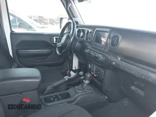 2020 Jeep Wrangler Unlimited Sport S with VIN 1C4HJXDG9LW237507, listed as a IAAI auction lot 42377928 with 48,217 mi miles and . Bid and sale history available at DreamBid. Image 5.