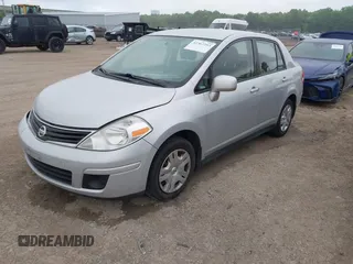 2010 Nissan Versa S with VIN 3N1BC1AP9AL404584, listed as a IAAI auction lot 42367293 with 158,377 mi miles and . Bid and sale history available at DreamBid. Image 19.