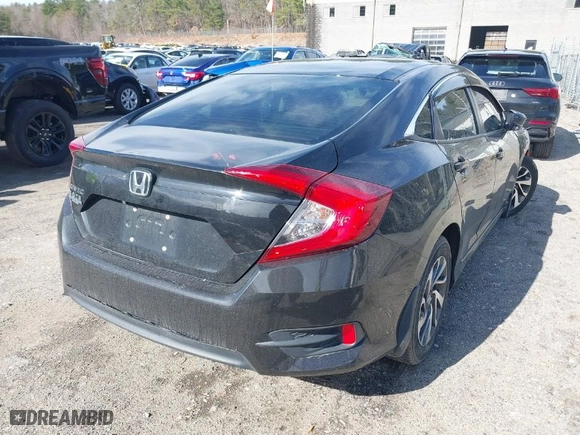 2016 Honda Civic Sedan EX with VIN 19XFC2F75GE215957, listed as a IAAI auction lot 41804027 with 104,229 mi miles. Bid and sale history available at carsss.com. Image 4.