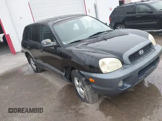 2002 Hyundai Santa Fe GLS z VIN KM8SC13DX2U140438, wystawiony jako IAAI lot #41474536 z przebiegiem Nie podano mil oraz . Historia ofert i sprzedaży dostępna na DreamBid. Obrazek 1.