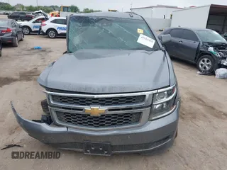 2020 Chevrolet Tahoe LS z VIN 1GNSCAKC3LR101733, wystawiony jako IAAI lot #41912918 z przebiegiem 153 731 mil mil oraz . Historia ofert i sprzedaży dostępna na DreamBid. Obrazek 12.