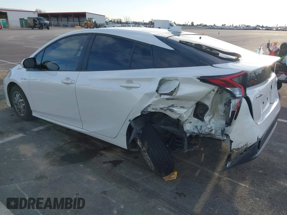 2018 Toyota Prius Two with VIN JTDKARFU1J3066710, listed as a IAAI auction lot 41636185 with 123,399 mi miles. Bid and sale history available at carsss.com. Image 3.