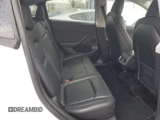 2022 Tesla Model Y Performance with VIN 7SAYGDEF3NF390848, listed as a Copart auction lot 49441025 with 42,488 mi miles and Salvage Title. Bid and sale history available at DreamBid. Image 11.