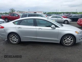 2016 Ford Fusion SE z VIN 3FA6P0H72GR120891, wystawiony jako IAAI lot #42364227 z przebiegiem 234 532 mil mil oraz . Historia ofert i sprzedaży dostępna na DreamBid. Obrazek 13.