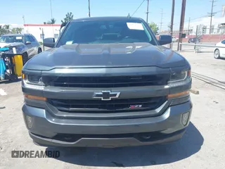 2018 Chevrolet Silverado 1500 LT with VIN 3GCUKREC1JG511846, listed as a IAAI auction lot 42024170 with 121,532 mi miles and . Bid and sale history available at DreamBid. Image 12.