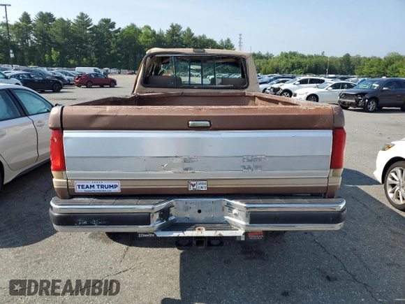 1990 Ford F-250 z VIN 2FTHF26H4LCA00395, wystawiony jako Copart lot #60321695 z przebiegiem 50 927 mil mil oraz Szkoda całkowita • Salvage title. Historia ofert i sprzedaży dostępna na DreamBid. Obrazek 6.
