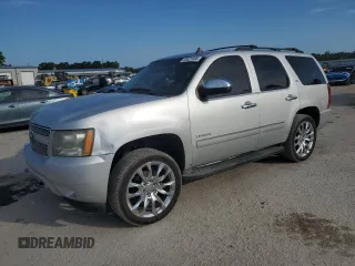 2010 Chevrolet Tahoe LTZ with VIN 1GNUKCE0XAR265499, listed as a Copart auction lot 55421585 with 255,370 mi miles and Salvage title. Bid and sale history available at DreamBid. Image 1.