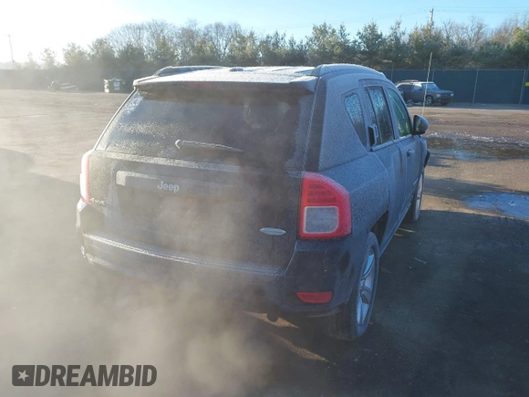 2012 Jeep Compass Latitude with VIN 1C4NJDEB5CD697957, listed as a IAAI auction lot 41807133 with 105,873 mi miles. Bid and sale history available at carsss.com. Image 4.