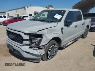 2023 Ford F-150 XL with VIN 1FTEW1CP4PKD19421, listed as a IAAI auction lot 42000462 with 60,323 mi miles and . Bid and sale history available at DreamBid. Image 2.