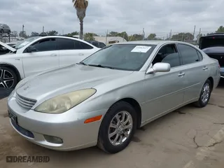 2003 Lexus ES 300 with VIN JTHBF30G736004651, listed as a IAAI auction lot 42082023 with 221,653 mi miles. Bid and sale history available at carsss.com. Image 2.