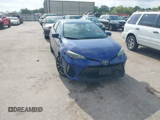 2017 Toyota Corolla L z VIN 5YFBURHE3HP621543, wystawiony jako IAAI lot #42284282 z przebiegiem 166 845 mil mil oraz . Historia ofert i sprzedaży dostępna na DreamBid. Obrazek 1.