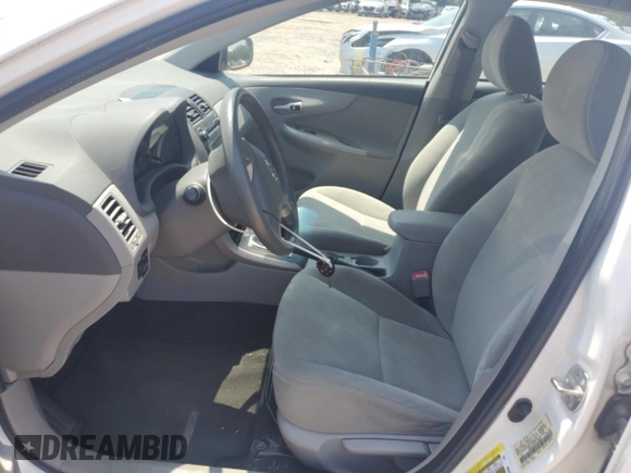 2010 Toyota Corolla with VIN 1NXBU4EE6AZ306666, listed as a Copart auction lot 58370215 with 128,586 mi miles and Salvage title. Bid and sale history available at DreamBid. Image 7.