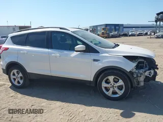 2014 Ford Escape SE with VIN 1FMCU0G94EUA35464, listed as a IAAI auction lot 42046944 with 88,504 mi miles. Bid and sale history available at carsss.com. Image 14.
