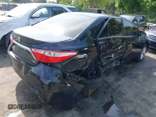 2017 Toyota Camry XLE z VIN 4T1BF1FK0HU403059, wystawiony jako IAAI lot #42112842 z przebiegiem 99 782 mil mil oraz . Historia ofert i sprzedaży dostępna na DreamBid. Obrazek 4.