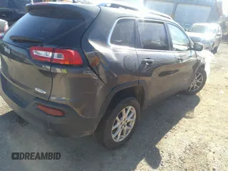 2015 Jeep Cherokee Latitude with VIN 1C4PJMCB5FW784536, listed as a IAAI auction lot 41667686 with 194,422 mi miles and . Bid and sale history available at carsss.com. Image 4.