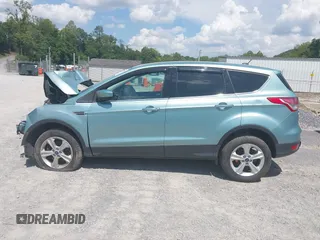 2013 Ford Escape SE with VIN 1FMCU9G98DUB92921, listed as a IAAI auction lot 42618998 with 135,497 mi miles and . Bid and sale history available at DreamBid. Image 14.